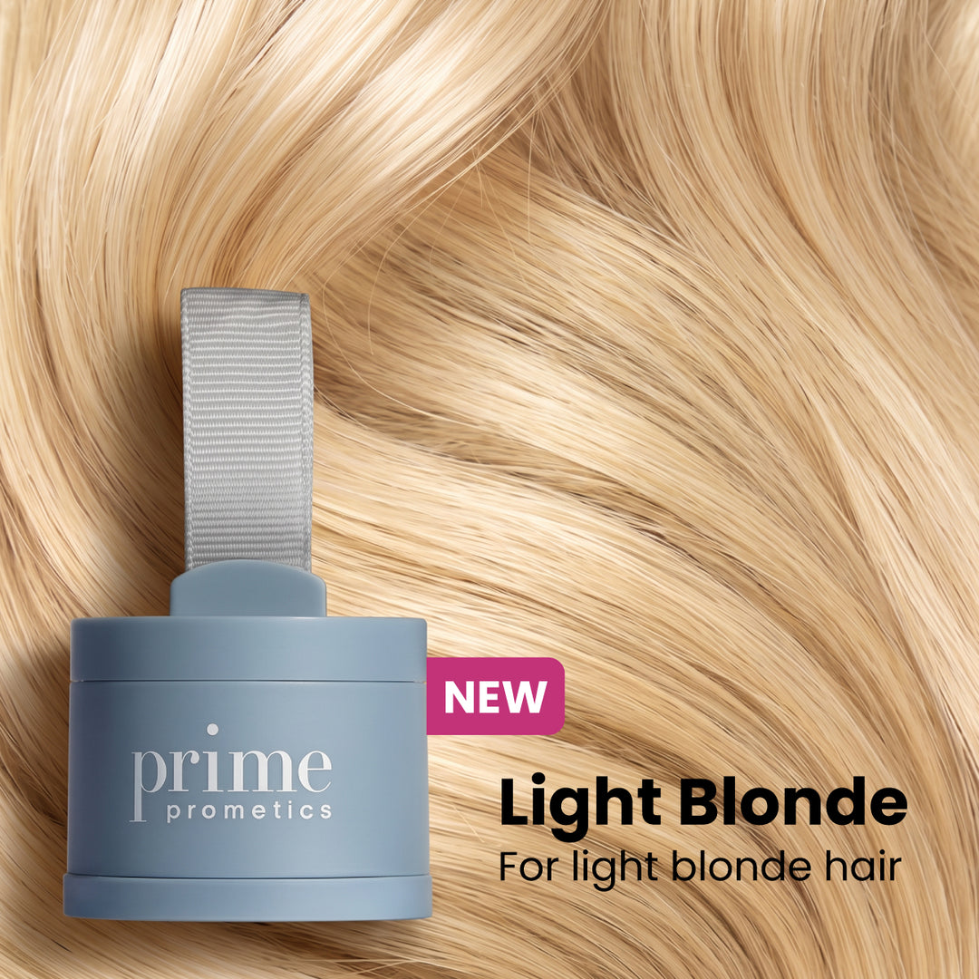 A blue Prime Prometics hair product container on top of light blonde hair strands with text: NEW Light Blonde For light blonde hair.