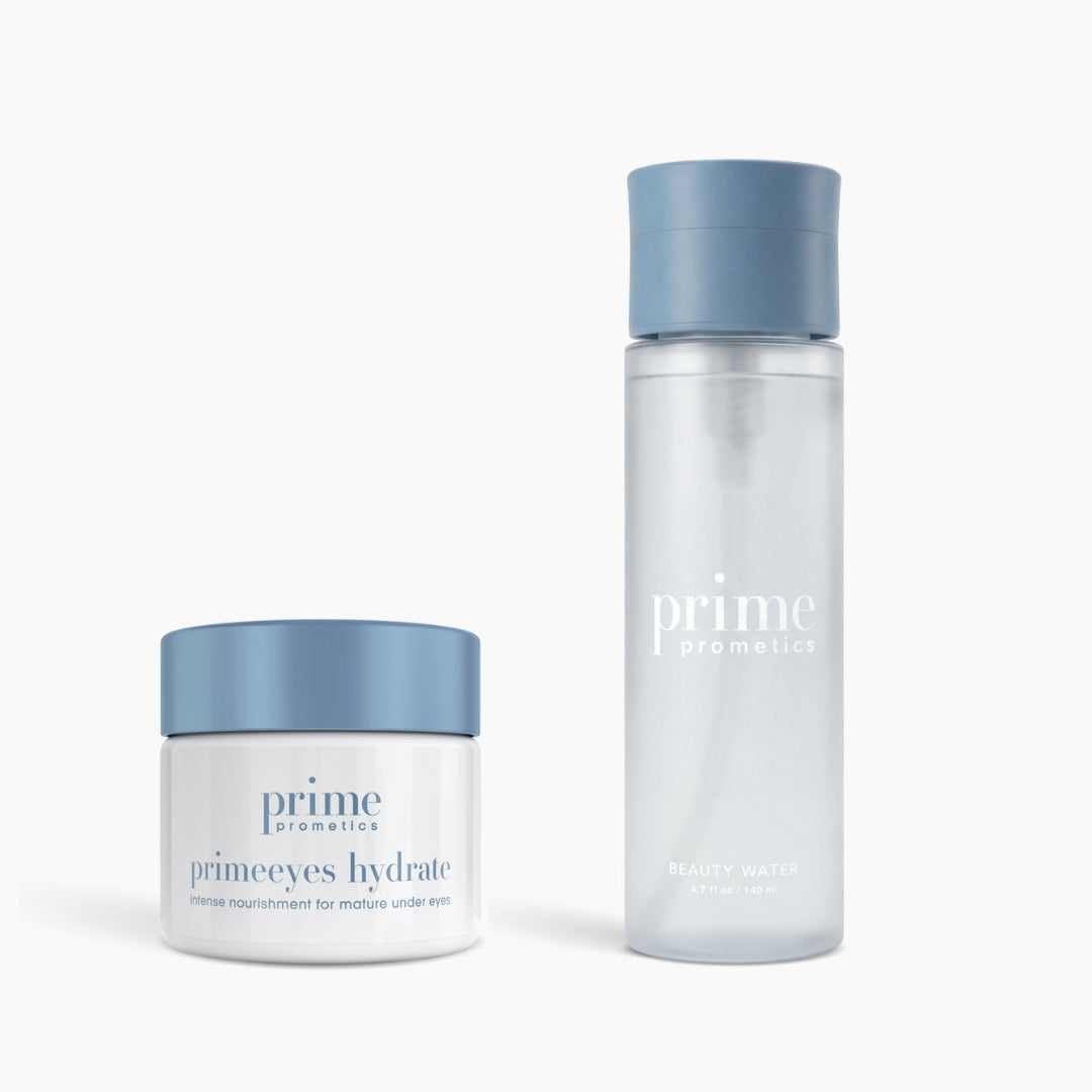 Two PrimePrometics™ products—PrimeEyes Hydrate in a small white jar with blue lid and PrimeSkin Beauty Water in a clear bottle with matching blue cap—displayed on a white background. Ideal for your daily skincare routine.