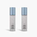 Two bottles of PrimePrometics™ 2pcs Color Changing Foundation with blue caps are shown side by side on a white background. The frosted glass bottles feature minimalist text highlighting their buildable, self-adjusting formula.