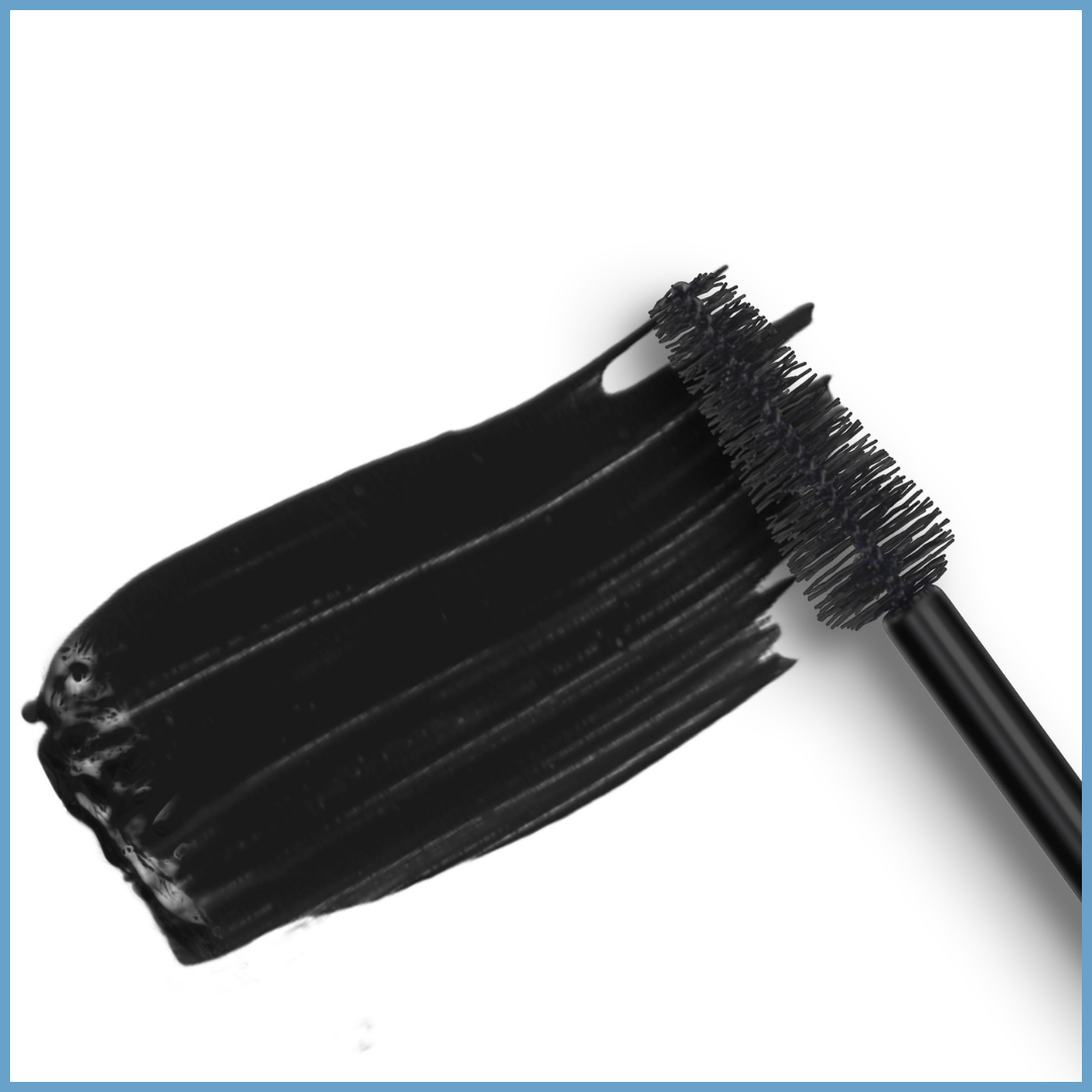 A black mascara brush with thick bristles is shown lying next to a bold swatch of black mascara on a white background, with a light blue border around the image.