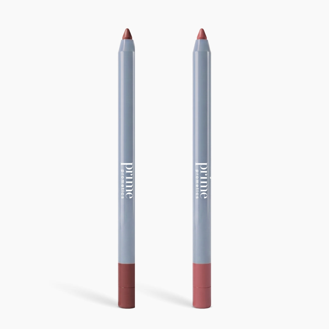 Two mauve 2-in-1 Velvet Lip Contour pencils from PrimePrometics™ feature gray bodies and rose bases, standing upright on white—ideal for defining lip contour and perfect for mature lips.