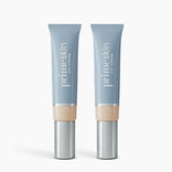 Two tubes of PrimePrometics™ 2pcs PrimeSkin CC+ Cream in Fair, with blue bodies, beige bases, and silver caps, stand upright on a white background. This cream blurs pores and offers flawless foundation coverage for women over 50.