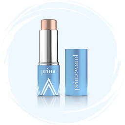 A blue and silver stick cosmetic product labeled prime with a matching blue cap lying beside it, both featuring white geometric designs, displayed on a light blue background with a circular brushstroke border.