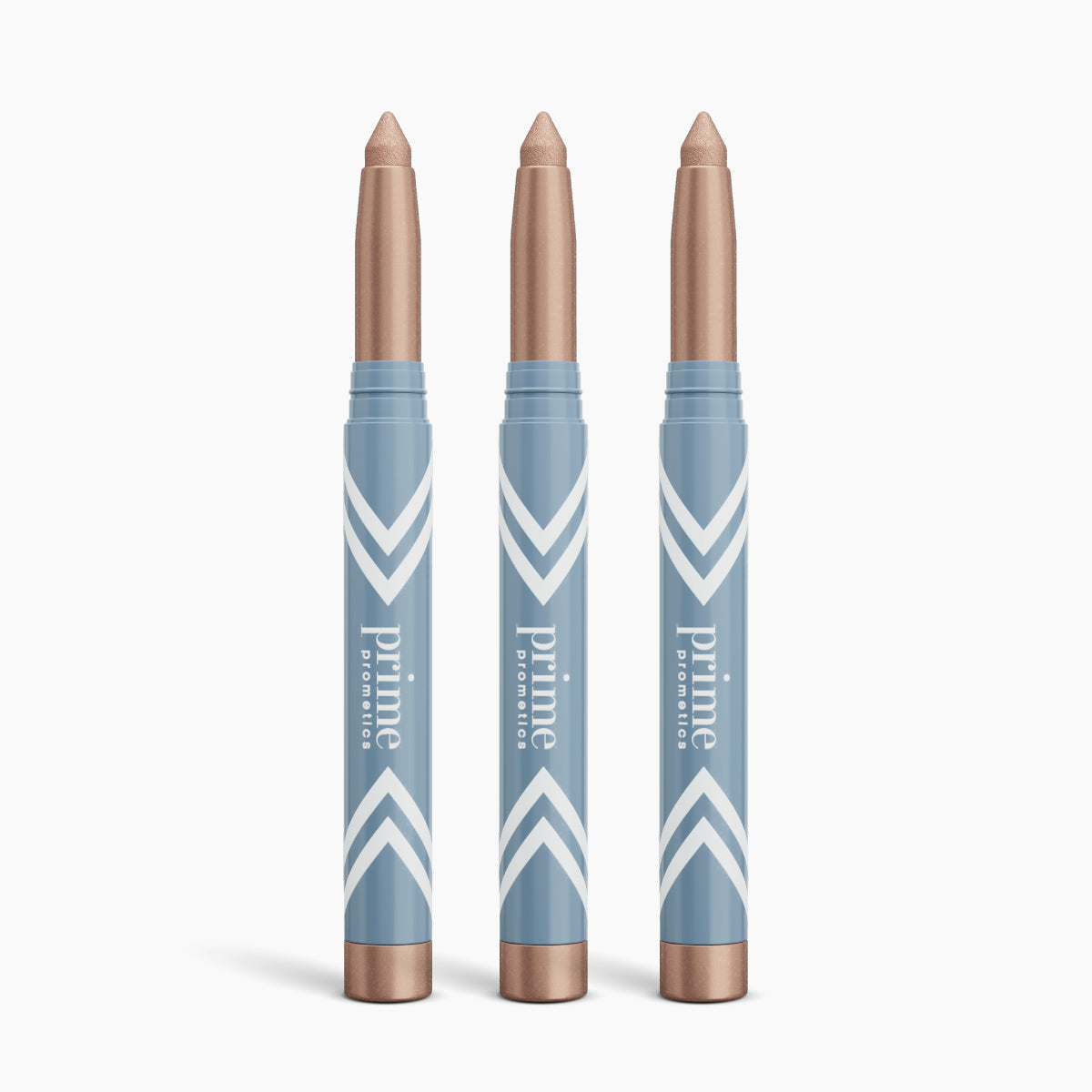 Three blue and rose gold PrimePrometics™ 3pcs PrimeEyes Eye Brightener sticks stand upright against a white background, each featuring a pointed shimmery beige tip and white chevron designs, ideal for brightening eyes or as under eye cream.