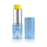 A blue tube of prime balm with white geometric accents, shown with the cap off to reveal a yellow stick, and the cap placed upright beside it labeled primewand.
