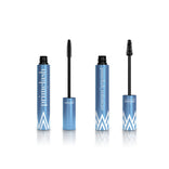 Two blue PrimePrometics™ Million-Dollar Lash Duo tubes with white zigzags stand upright, lids off to display the brushes—one thin for mascara, one thick for volumizer.