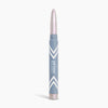 A silver and blue makeup stick with a twist-up creamy tip, labeled PrimePrometics™, stands upright on a white background—this illuminating eyeshadow, PrimeEyes Eye Brightener, is specially designed to create an instant eye lift effect, making it the ideal eyeshadow for women over 50.