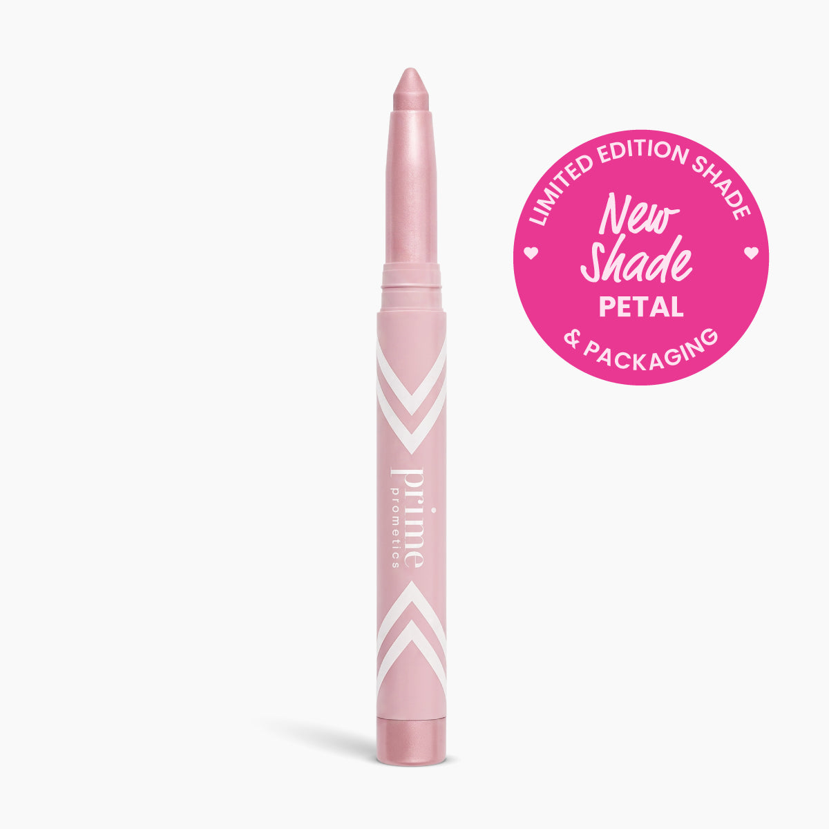 A pink makeup crayon labeled PrimeEyes Eye Brightener by PrimePrometics™ with a “New Shade Petal” sticker—an illuminating eyeshadow for women over 50, offering an instant eye lift effect.