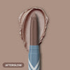 Prime Prometics PrimeEyes Eye Brightener in Afterglow with warm swatch and stick