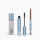 The PrimePrometics™ Prime Heroes Set features three blue-capped products—Color Changing Foundation, PrimeLash Mascara, and PrimeEyes Glide eyebrow pencil—displayed side by side on a white background.