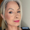 Mature gray-haired woman wearing Prime Prometics PrimeEyes Glide Eyeliner in Sapphire, a blue shade