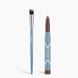 The Seamless Shadow Bundle Matte by PrimePrometics™ features a blue-handled cream eyeshadow brush with white-tipped bristles and a brown "prime" makeup stick in a light blue case, both upright on a white background—ideal for creating flawless matte eye looks.