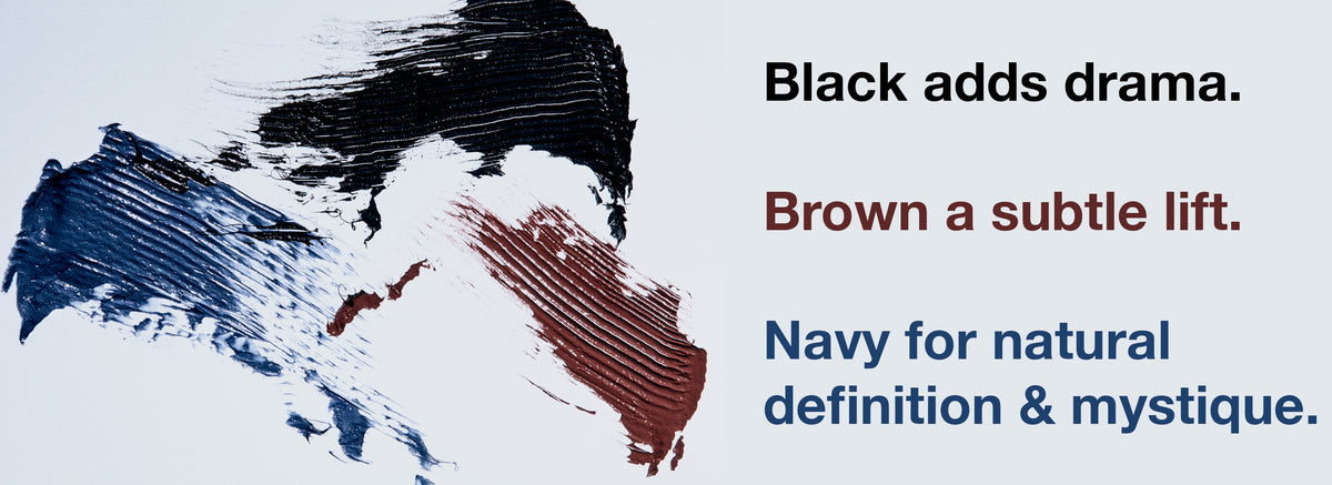 Abstract brushstrokes of black, brown, and navy paint on a pale background, with text: Black adds drama. Brown a subtle lift. Navy for natural definition & mystique.