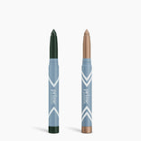 Two PrimePrometics™ PrimeEyes Eye Brightener sticks with blue and white packaging stand upright—one with a dark green tip, the other shimmery beige—ideal as an eye brightener or under eye cream. 2pcs per set.