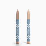 Two PrimePrometics™ 2pcs PrimeEyes Eye Brightener sticks with rose gold caps—one capped, one revealing its light shimmer tip. "prime" appears in white on the label. Ideal for luminous eye care. Set on a white background.