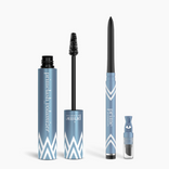 PrimePrometics™ Eye Upgrade Duo features two blue and white cosmetic products—an open Volumizer mascara tube with wand and a Glide Eyeliner pencil with sharpener—both standing upright on a white background.