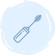 A simple blue line drawing of a mascara wand with a cylindrical handle and a spiral brush, set against a light blue circular background.