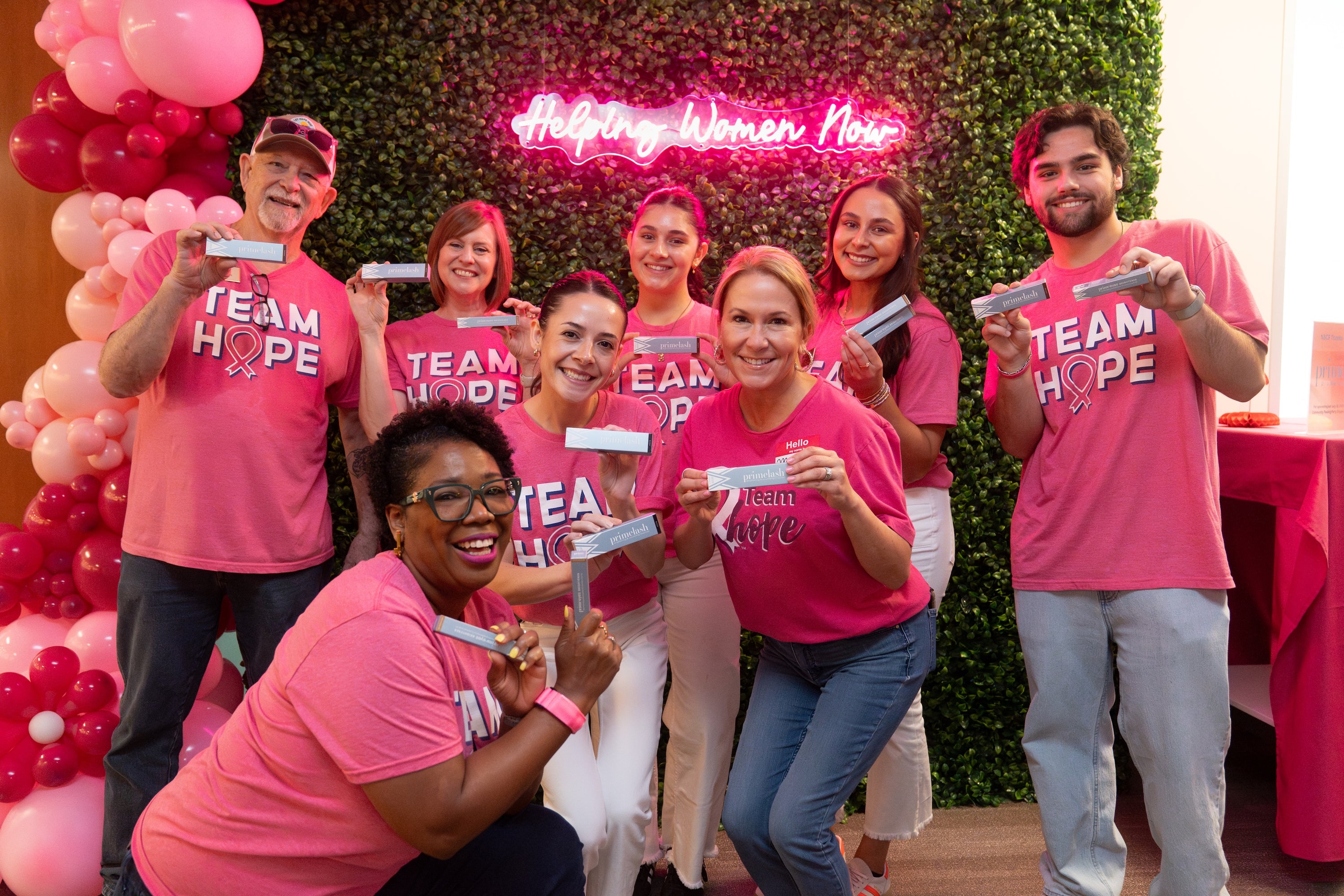 Team Hope volunteers at a Prime Prometics breast cancer charity event.