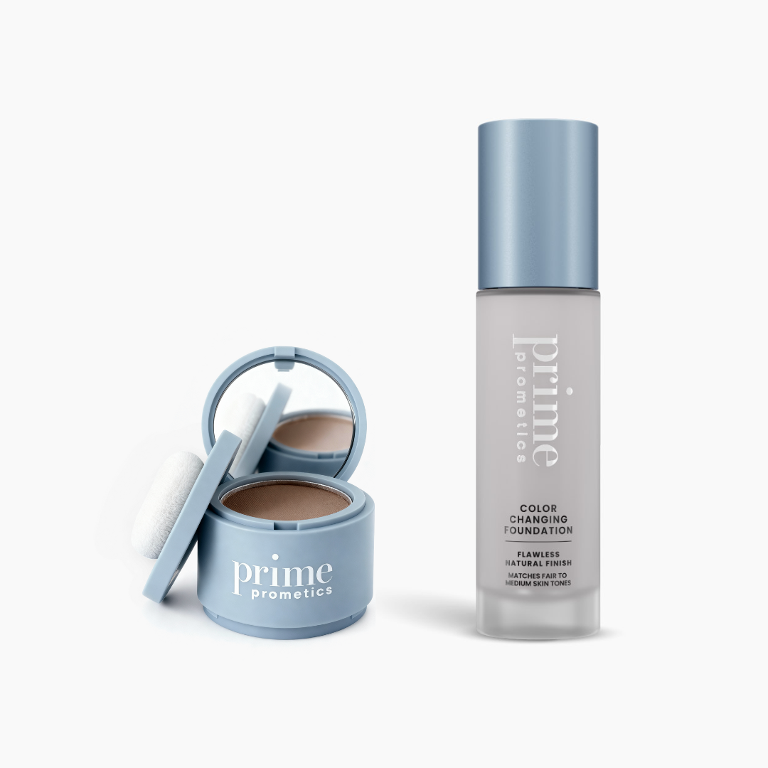 A light blue compact with a mirror and powder puff sits open next to a matching bottle of PrimePrometics™ Instant Glow-Up Duo on a white background.