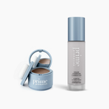 A light blue compact with a mirror and powder puff sits open next to a matching bottle of PrimePrometics™ Instant Glow-Up Duo on a white background.