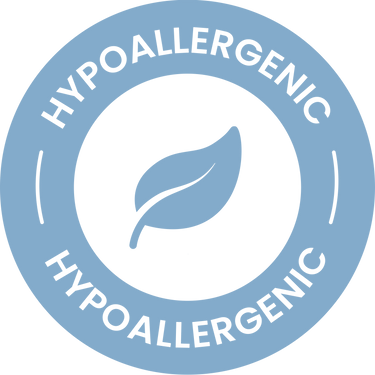 A blue circular badge with a white center featuring a simple leaf graphic. The word HYPOALLERGENIC appears in white, curved along the top and bottom edges of the badge.