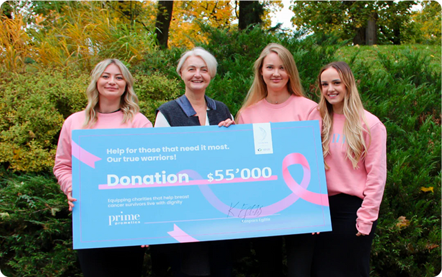 Charity partners receiving a $55,000 donation to fund a rehabilitation center.