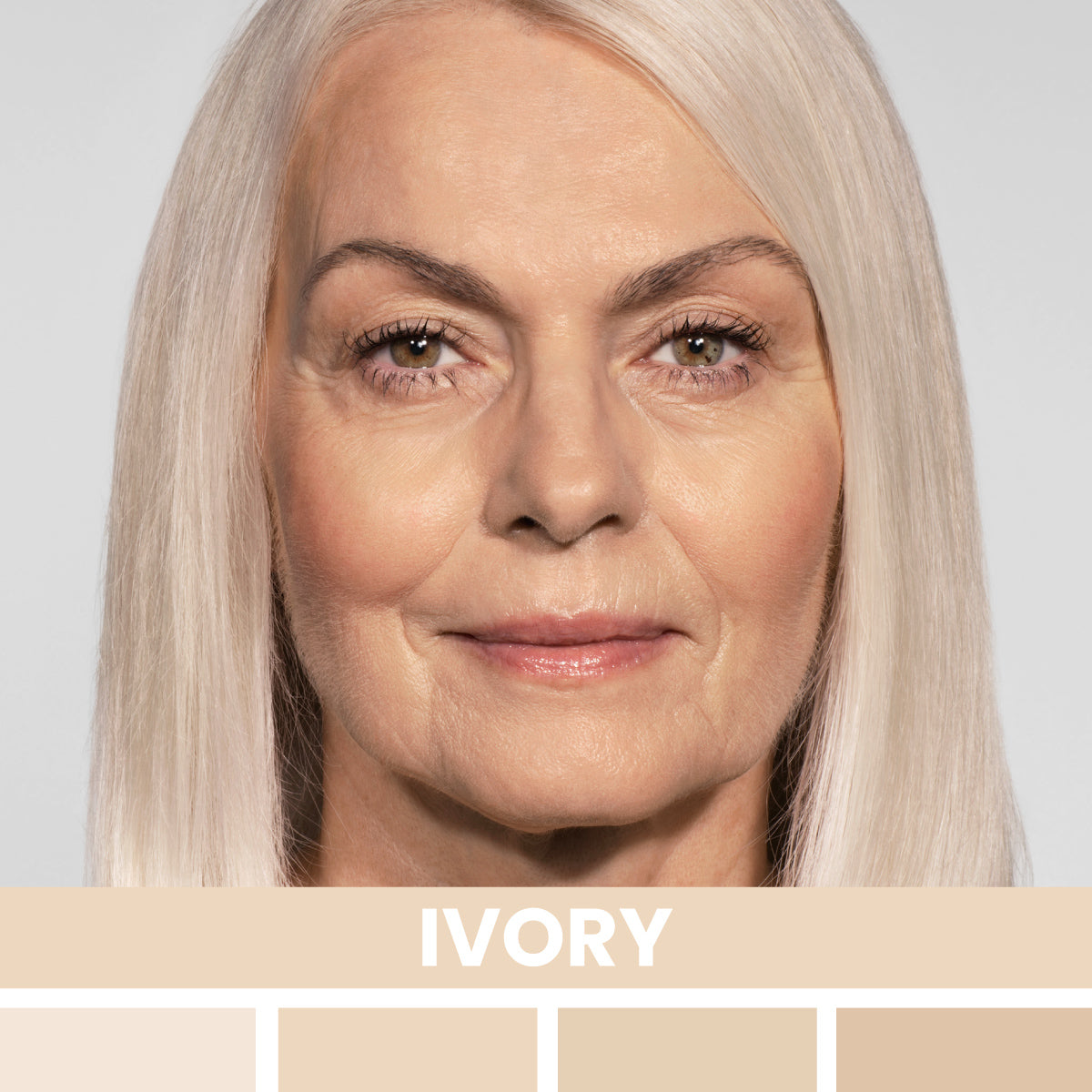 A woman with long, straight, light blonde hair and fair skin is shown facing forward. Below her face, a palette of ivory skin tone shades is labeled IVORY.