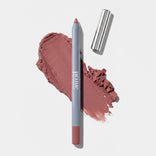 PrimePrometics™ Velvet Lip Contour, a mauve lip liner with a silver cap, lies on a matching mauve smudge against a white background. Designed for mature lips, it offers precision and comfort for an effortlessly defined look.