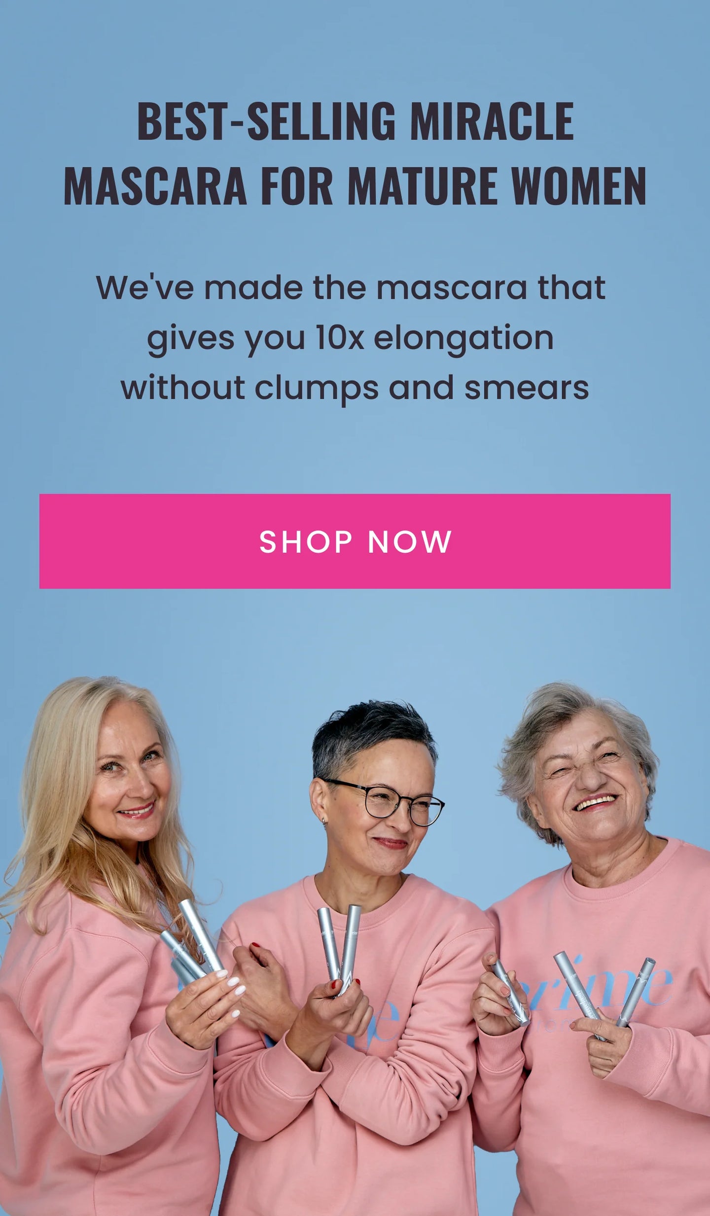 Three smiling older women wearing pink sweatshirts hold mascaras against a blue background. Text above promotes a best-selling mascara for mature women, claiming 10x elongation without clumps or smears. A pink Shop Now button is visible.