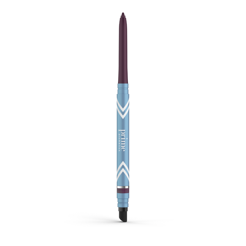 A blue and purple retractable eyeliner pencil with chevron patterns and the word prime printed on the body, shown standing upright on a white background.