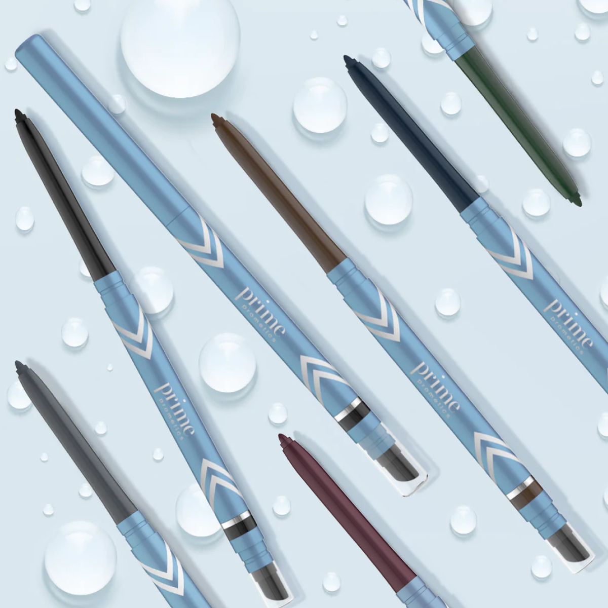 Multiple blue makeup pencils with different colored tips and angled white chevron designs are scattered on a light blue background with water droplets. The word prime is printed on each pencil.