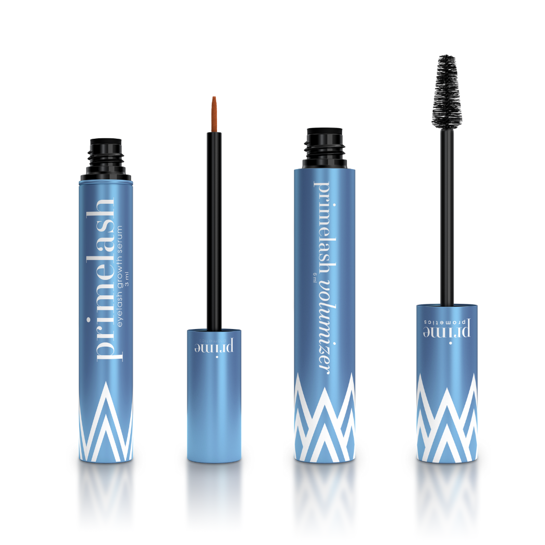 Four blue PrimeLash Volumizer Bundle tubes by PrimePrometics™ stand upright. Two are open, showing a thin brush for eyelash serum and a mascara wand for volume; the other two are closed. Each tube features white geometric designs.