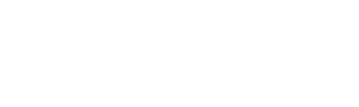The image shows the words prime prometics in large, light gray lowercase letters on a pale background. The word prime is above prometics, with a dot above the i in prime.