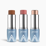 Three makeup sticks from the PrimeWand Contour Kit by PrimePrometics™—including bronzer, highlighter, and blush—stand upright in blue and silver tubes against a white background.