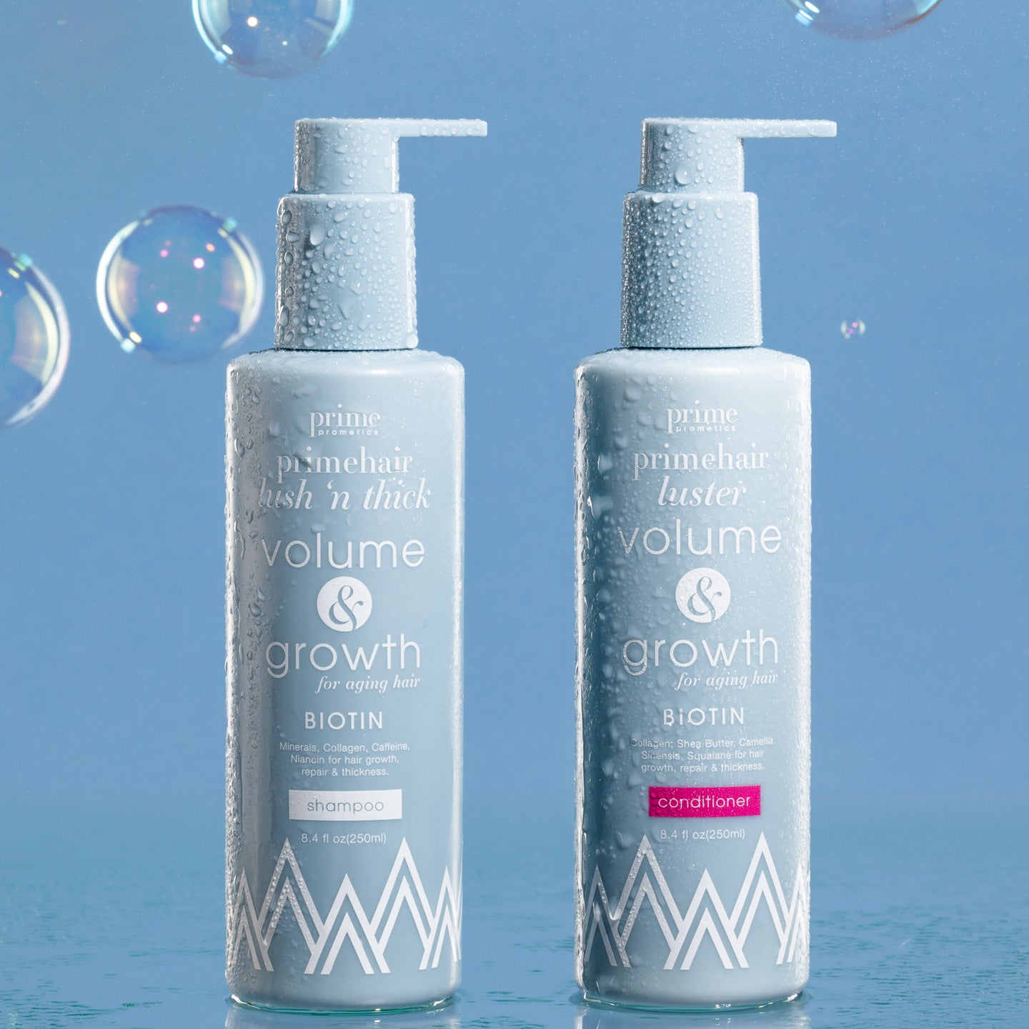 Two light blue pump bottles of PrimePrometics™ Build Your Own Bundle, labeled shampoo and conditioner, stand upright with water droplets. Iridescent bubbles float against a light blue background—a dreamy scene for your custom haircare set.