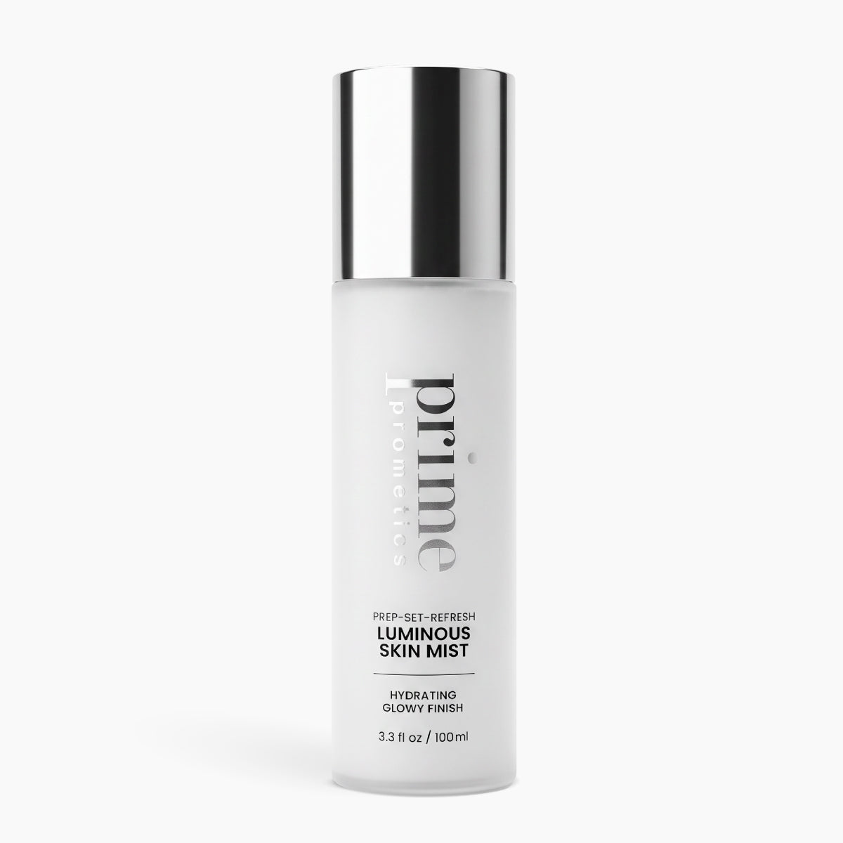 A cylindrical Prep-Set-Refresh Luminous Skin Mist spray bottle featuring a silver cap and a frosted glass base.