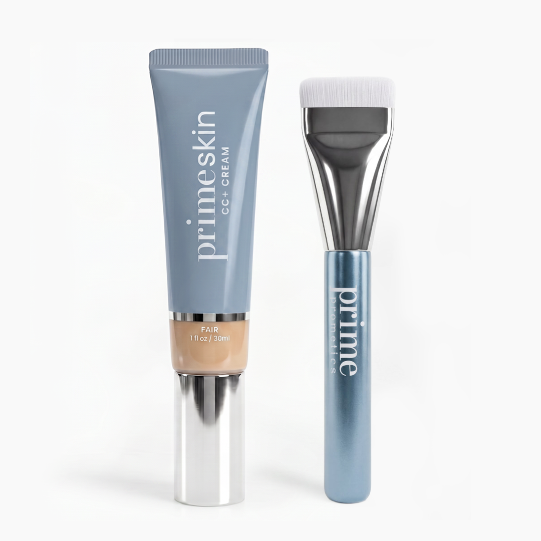 The Seamless Skin Duo by PrimePrometics™—a tube of primeskin CC+ cream in Fair and a wide, flat-headed makeup brush with a blue handle—stand upright side by side against a white background.
