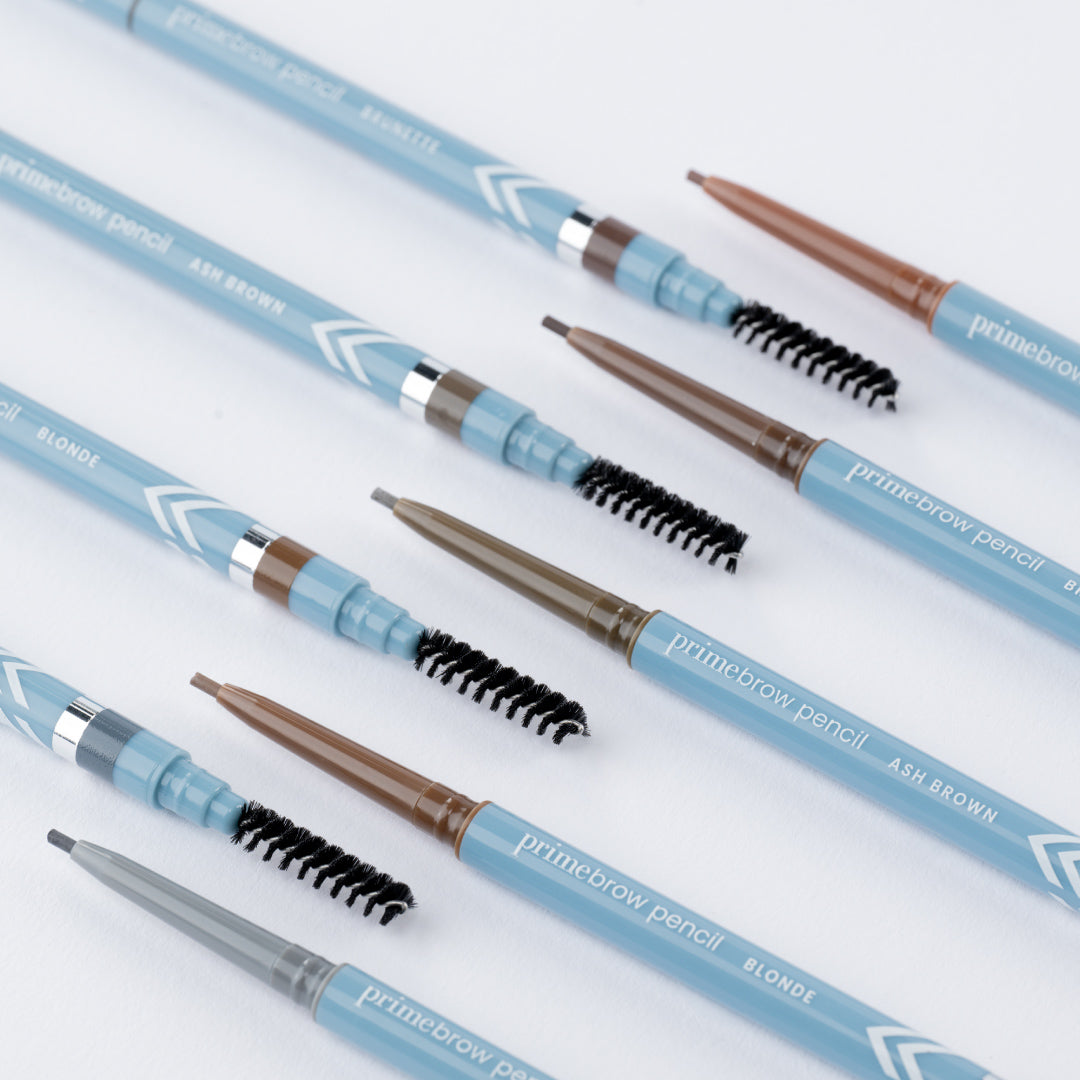 Prime Prometics PrimeBrow Pencil shade range with five pencils and spoolie brushes shown together