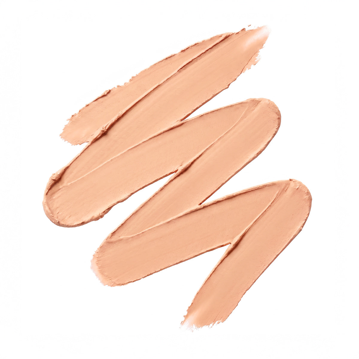 A zigzag smear of PrimePrometics™ Undereye Brightening Corrector on a white background highlights its creamy texture and smooth application for concealing dark circles.