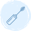 A simple blue line drawing of a mascara wand with a brush tip, shown against a light blue circular background.