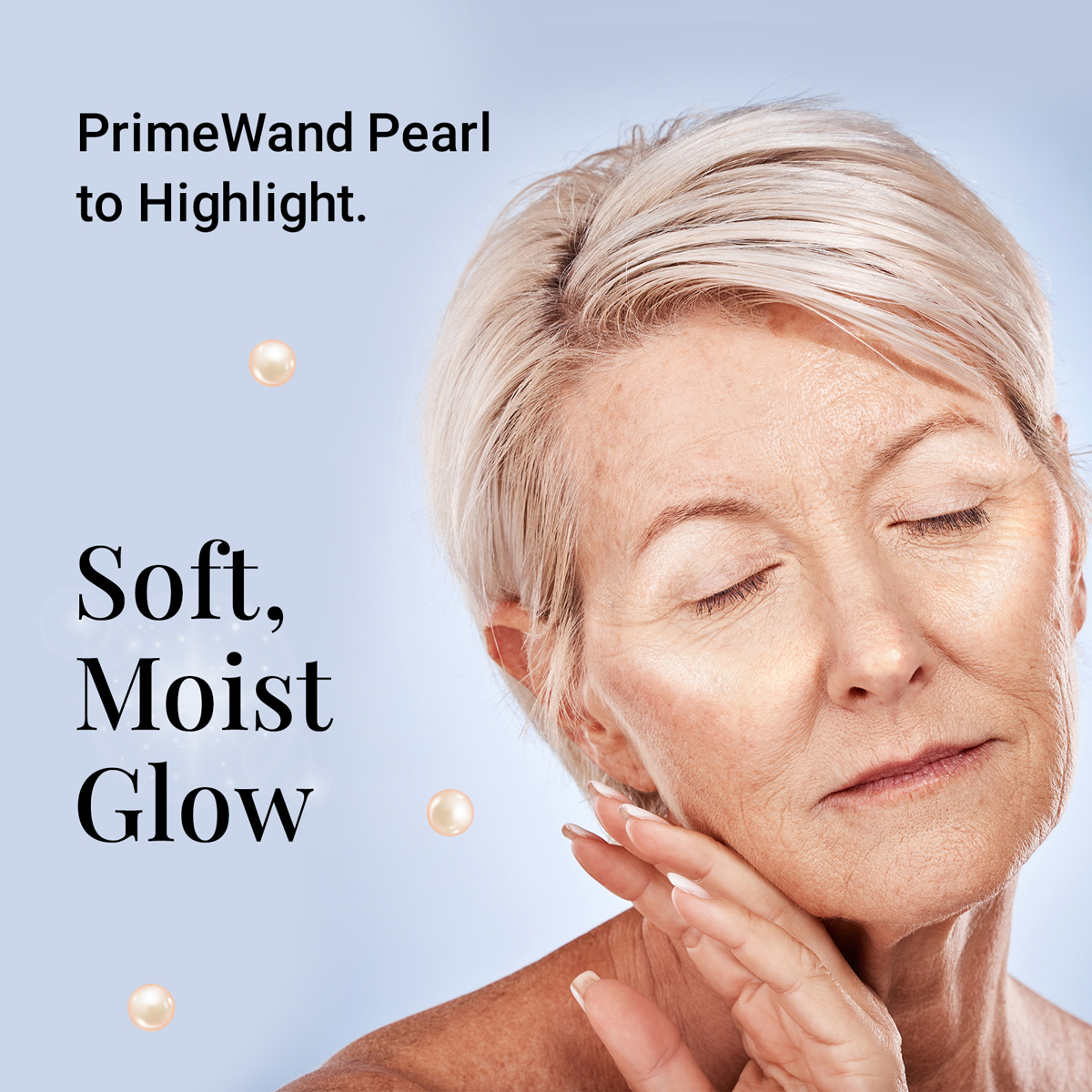 PrimeWand Pearl to highlight: a mature woman with short blonde hair touching her cheek with a soft, moist glow