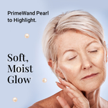 PrimeWand Pearl to highlight: a mature woman with short blonde hair touching her cheek with a soft, moist glow