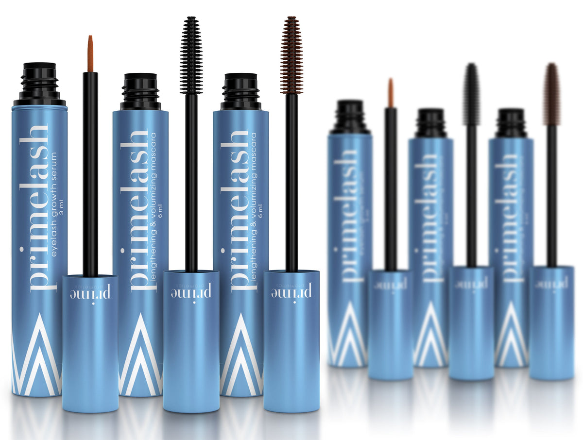 A row of blue PrimePrometics™ 2x Both Mascaras with black wands and brown brushes stands upright against a white background, some with exposed applicators, ideal for pairing with the included Lash Serum for enhanced lash growth.